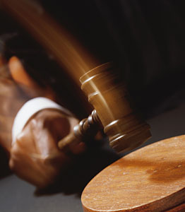 Courtroom scene of judge with gavel 
